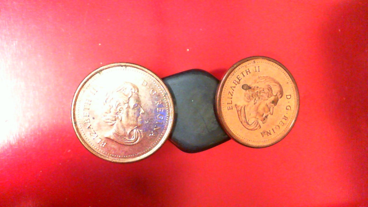 2006 Canada pennies, magnetic, with no logo and no P - rare (QTY of 2) 2006 Canada pennies, magnetic, with no logo and no P - rare (QTY of 2)